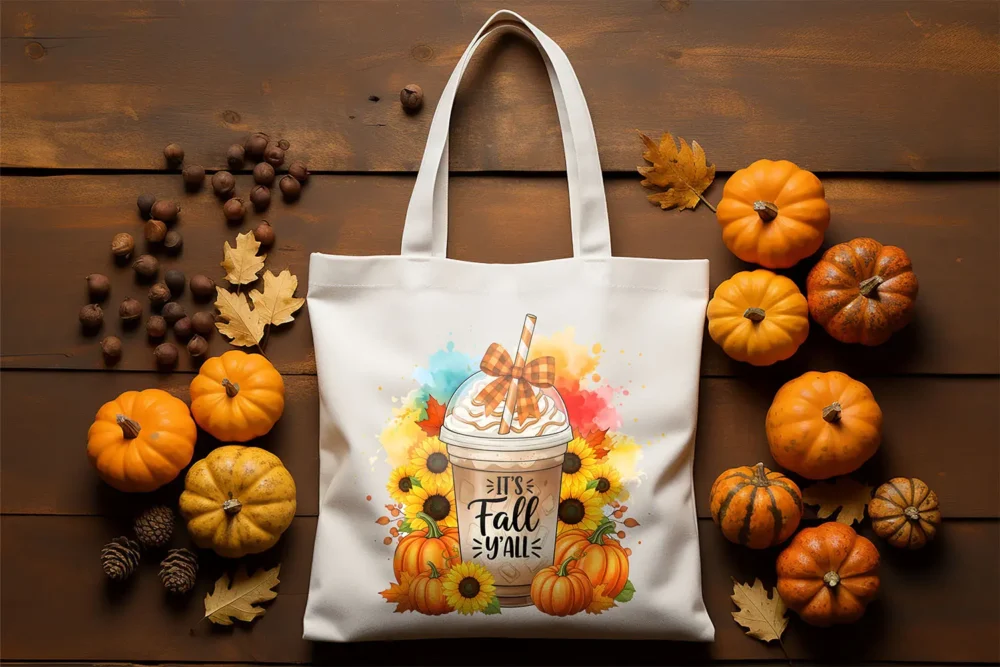 Cozy autumn tote bag mockup with “It’s Fall Y’all” PNG sublimation design featuring coffee, pumpkins, and sunflowers