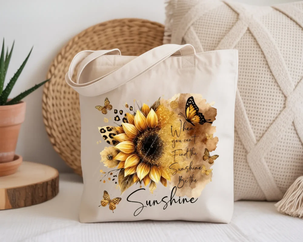 Tote bag mockup featuring Be the Sunshine PNG sunflower motivational quote