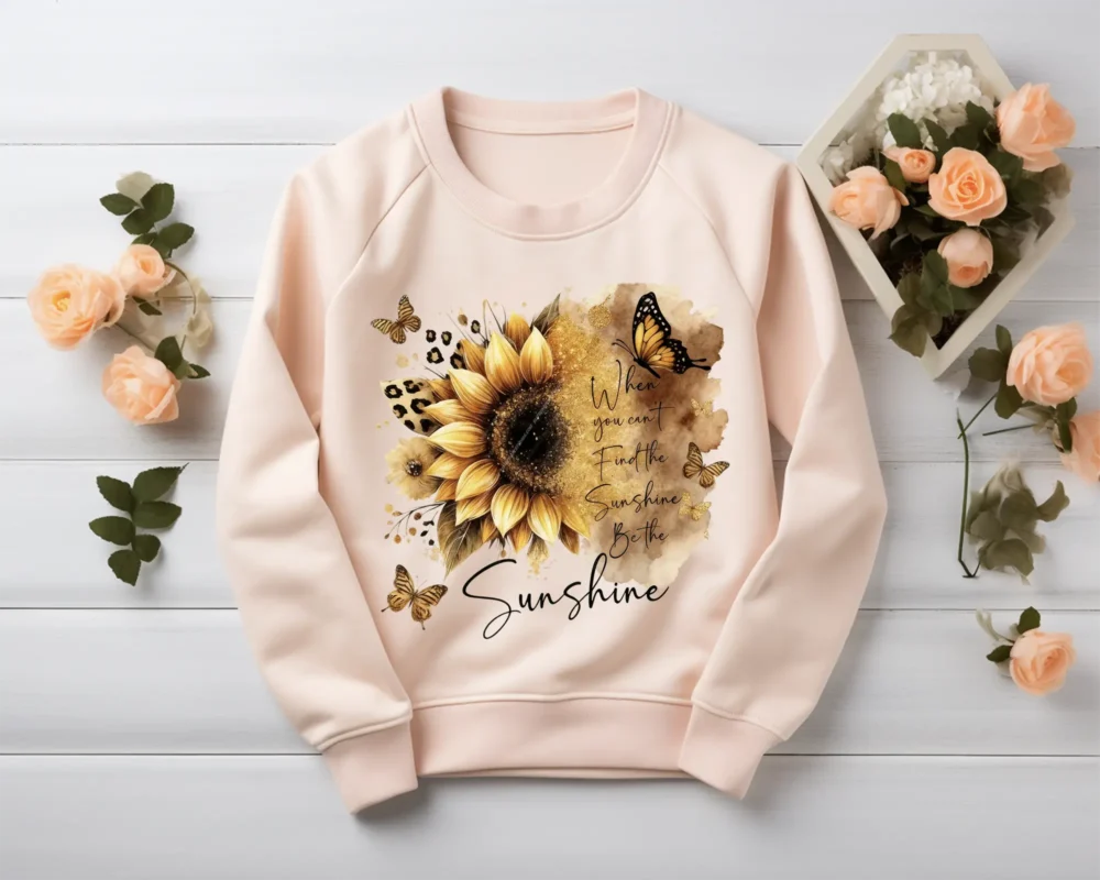 Blush sweatshirt mockup displaying sunflower inspirational quote design
