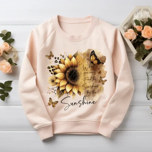 Blush sweatshirt mockup displaying sunflower inspirational quote design