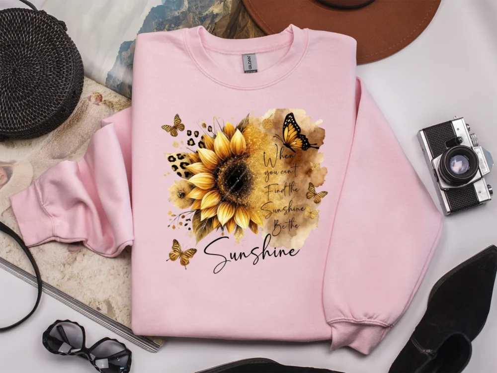 Light pink sweatshirt showing positive affirmation sunflower quote design
