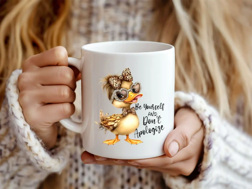 Woman holding white mug with Be Yourself PNG duck design