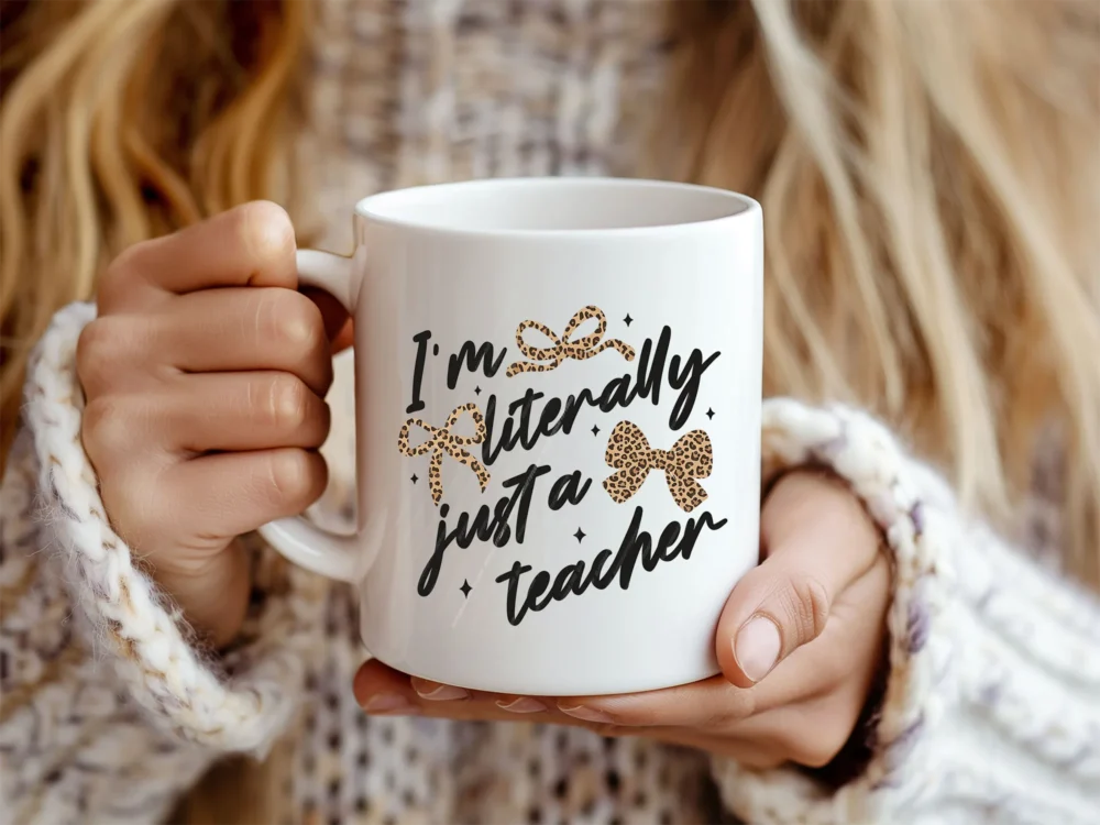 White coffee mug featuring the Literally Just a Teacher PNG