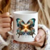 Nature inspired butterfly artwork on a white coffee mug.
