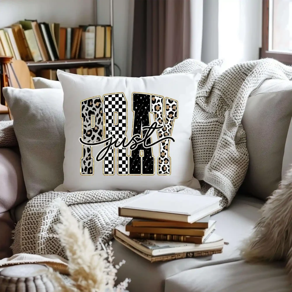 White pillow featuring varsity leopard Christian graphic