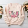 High-quality Floral Teacher Faux Knitted PNG with 3D faux yarn textures and pink flowers