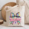 Canvas tote bag featuring a 3D rainbow teacher design