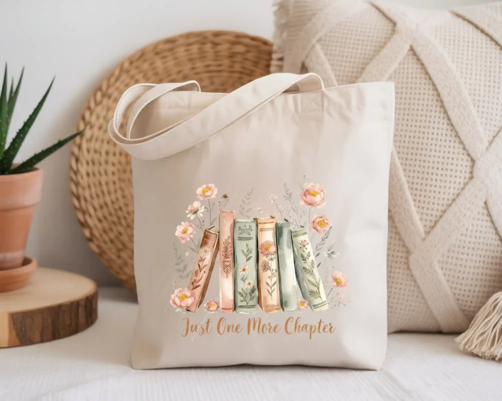 Just one more chapter png on book lover tote bag