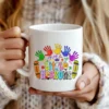 White coffee mug featuring the Little Reasons Teacher PNG
