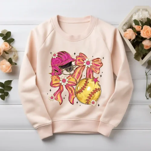 Softball Mom shirt design on a blush pink crewneck sweatshirt