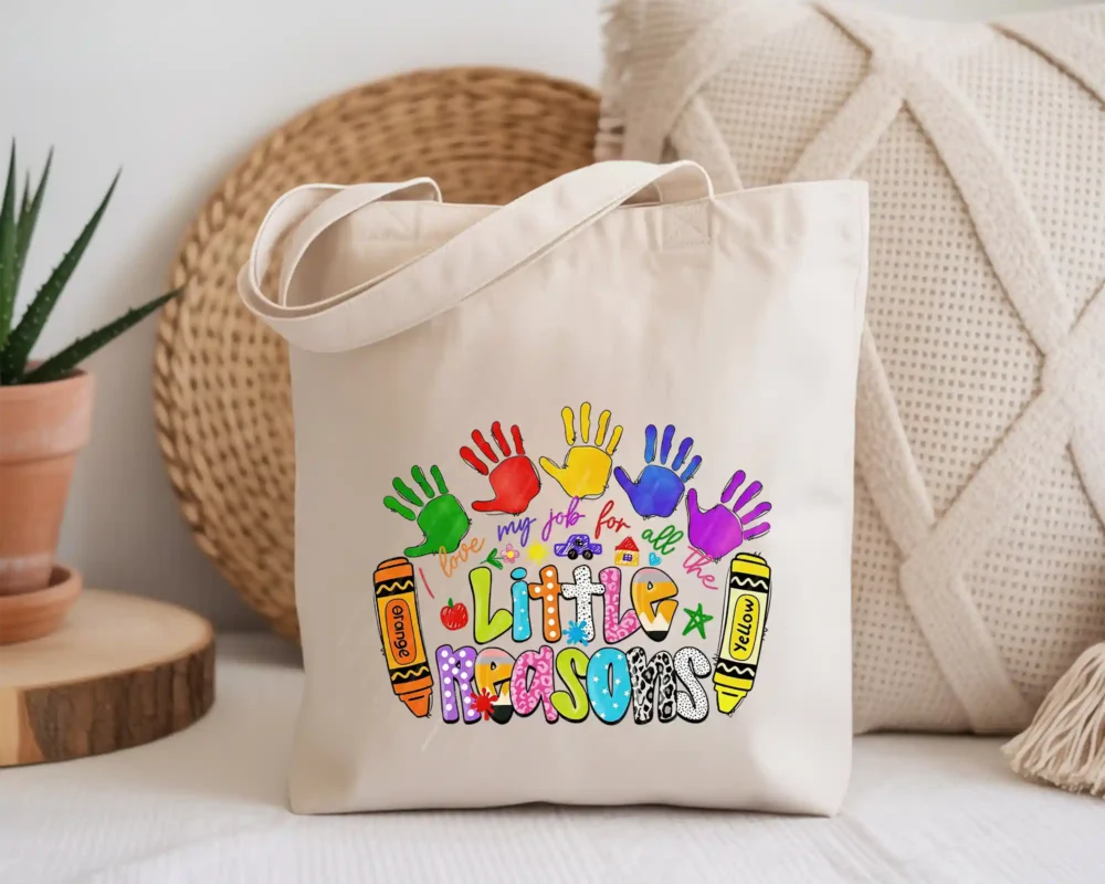 Canvas tote bag featuring a colorful crayon teacher design