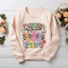 Teaching My Favorite Peeps PNG on a light blush sweatshirt