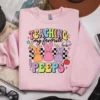 Teaching My Favorite Peeps PNG featured on a light pink top