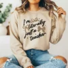 Girl wearing a brown hoodie with a leopard bow graphic