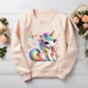 Cute rainbow unicorn PNG on blush sweatshirt