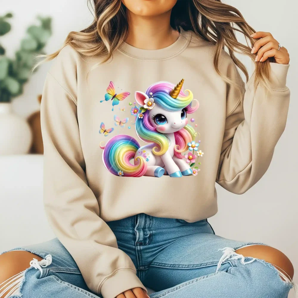 Girl wearing sweatshirt with cute unicorn design