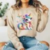 Girl wearing sweatshirt with cute unicorn design