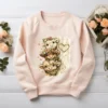 Blush sweatshirt featuring valentine highland cow design