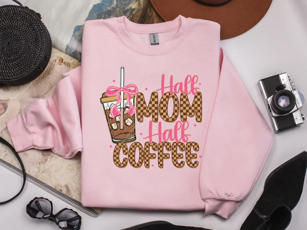 Aesthetic Mama PNG design printed on a light pink crewneck sweatshirt