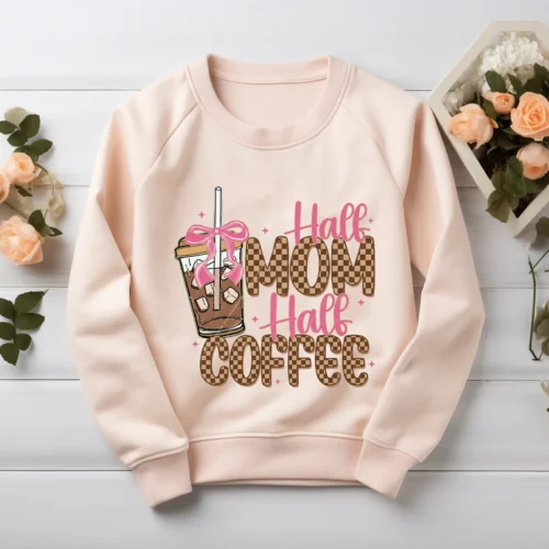 Coquette Bow PNG and checkered mama design on a blush pink sweatshirt