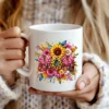 White coffee mug featuring a floral mama PNG sublimation design