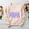 MAMA Hand Painted PNG printed on a blush sweatshirt