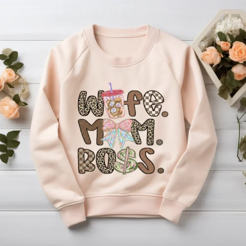 Mom Wife Boss PNG printed on a blush color sweatshirt