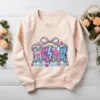 Preppy Pink Mama PNG design on a blush pink sweatshirt