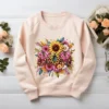 Blush pink sweatshirt displaying a watercolor mama PNG with pink glitter letters