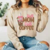 Girl wearing a light brown sweatshirt with Western Mama PNG coffee design
