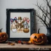 Black ornate picture frame displaying a printable steampunk ghost PNG art print sitting on a wooden mantle flanked by carved jack-o'-lanterns.