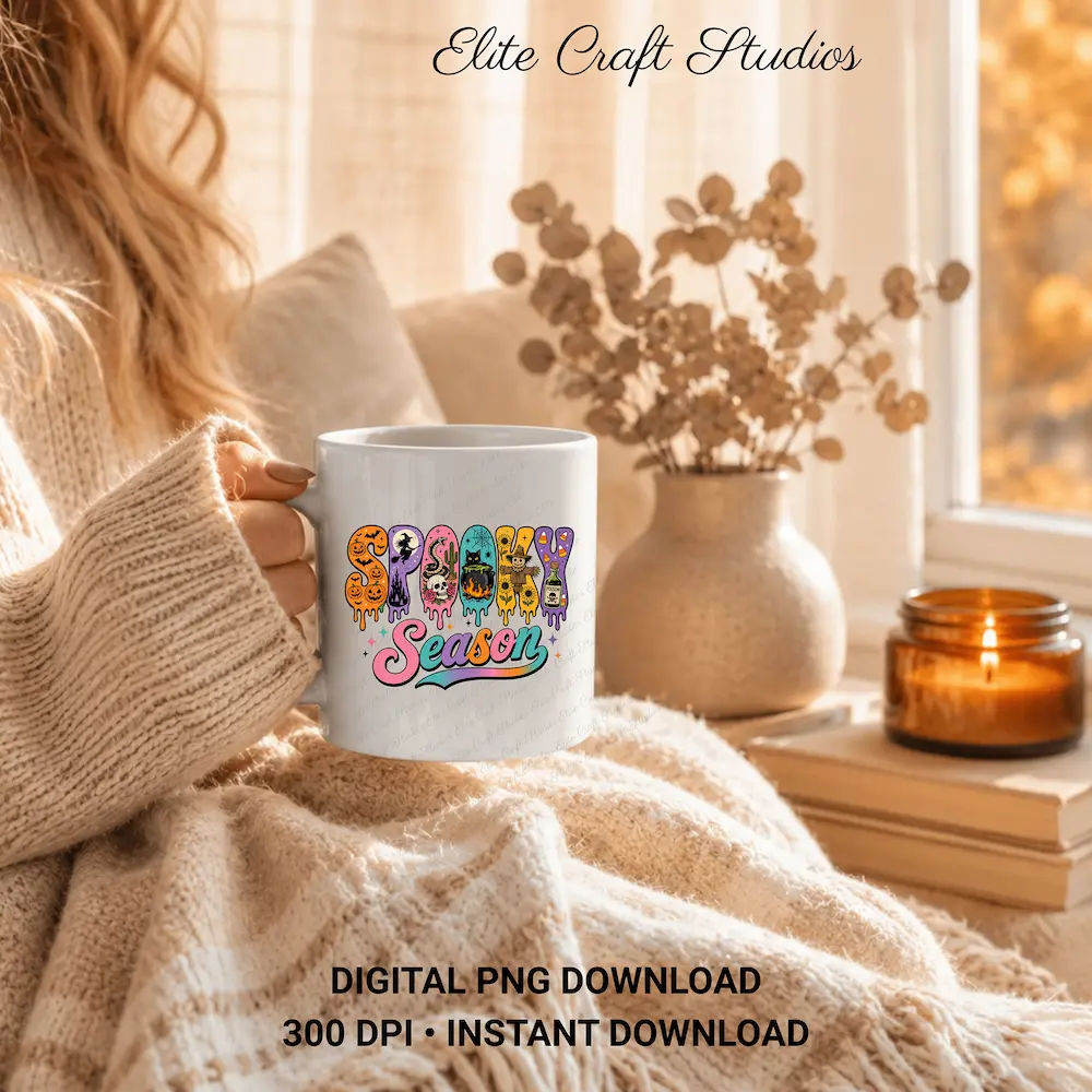 Woman wrapped in a knit cardigan holding a white ceramic coffee mug printed with the retro Spooky Season sublimation design next to a window.