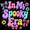 In My Spooky Era colorful dripping text illustration with leopard print bows and flowers displayed against a solid black background.