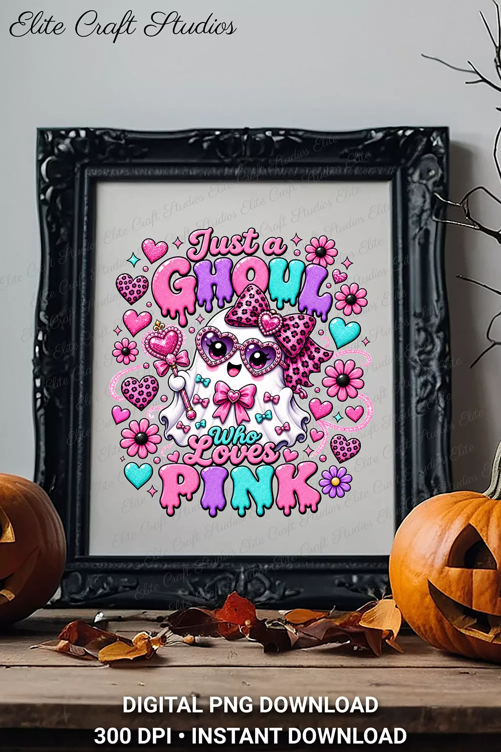 Black ornate picture frame displaying the Just a Ghoul Who Loves Pink graphic, placed on a wooden mantle flanked by carved jack-o'-lanterns.